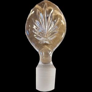 vintage crystal decanter stopper featuring a leaf design